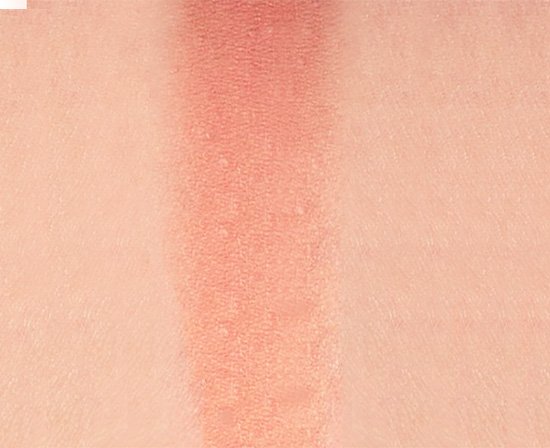 Swatch of Huda Beauty Glowish Blush Powder in Healthy Peach